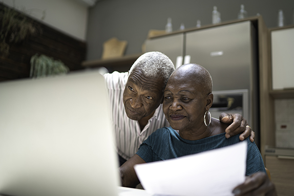 older couple attending a neurogenetics counseling appointment online